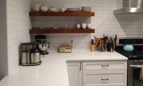 white kitchen counter and backsplash Von Tobel