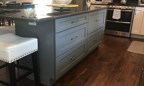 Kitchen island with cabinetry Von Tobel