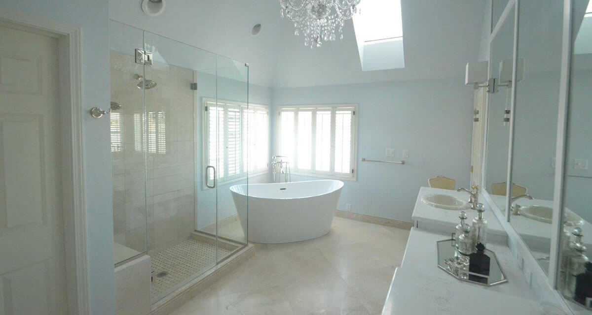 Glam bathroom with chandelier