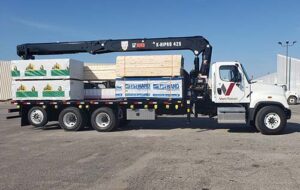 Von Tobel lumber delivery boom truck
