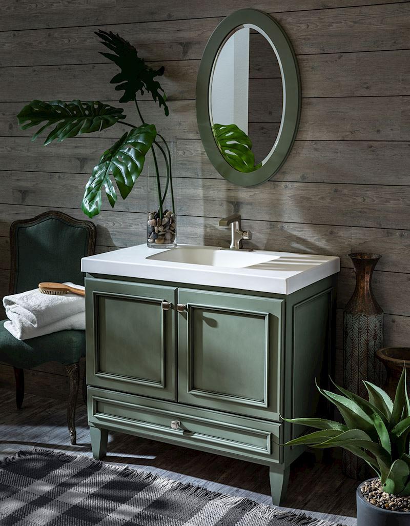Light green bathroom vanity with white countertop