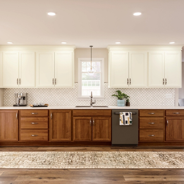 KraftMaid kitchen with white upper cabinets and wooden base cabinets